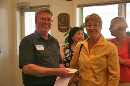 Jill Petit receiving second place peoples' choice award.